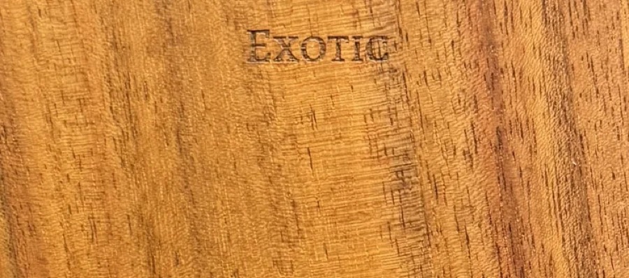 Detail of Koa grain — figured wood texture, photographed at Raw Heartwood