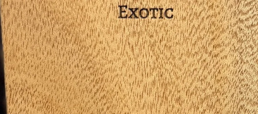 Detail of Queensland Maple grain — figured wood texture, photographed at Raw Heartwood